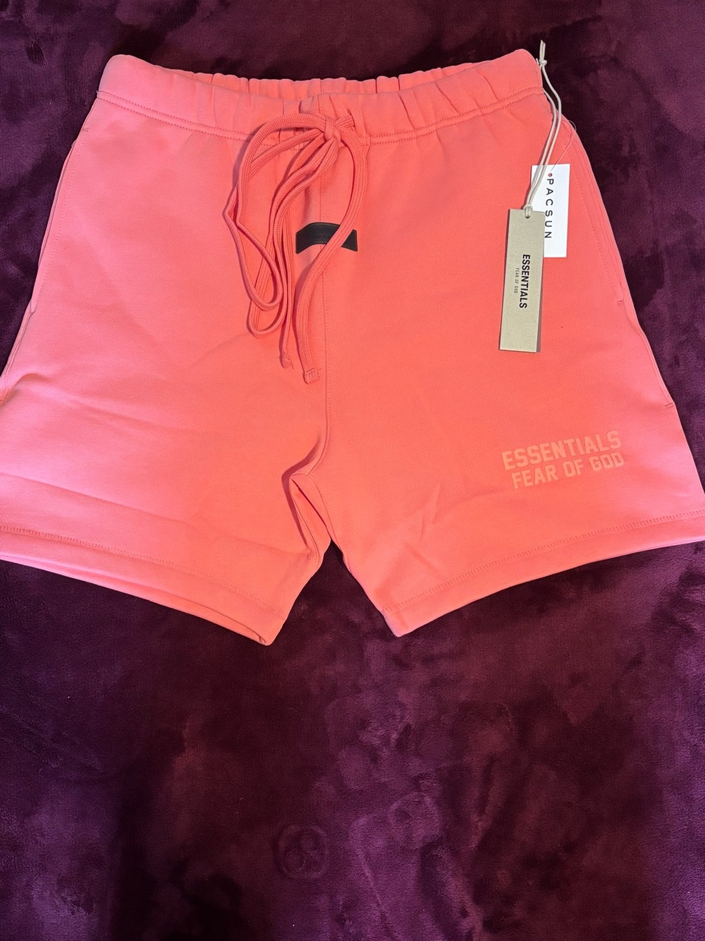 Men’s Fear of god Essentials coral shorts